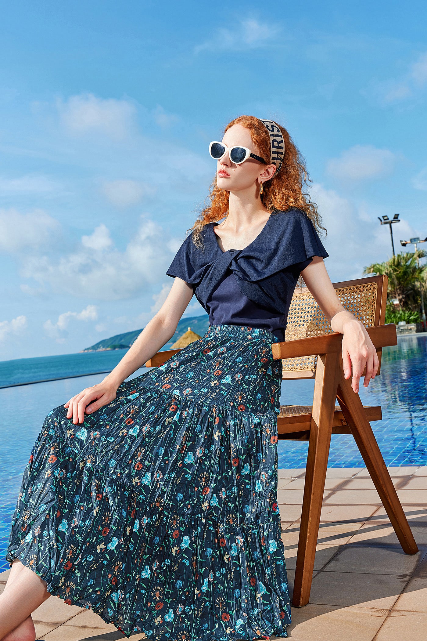 KAMILAN Pleated Midi Skirt in Ocean Blue Floral Print