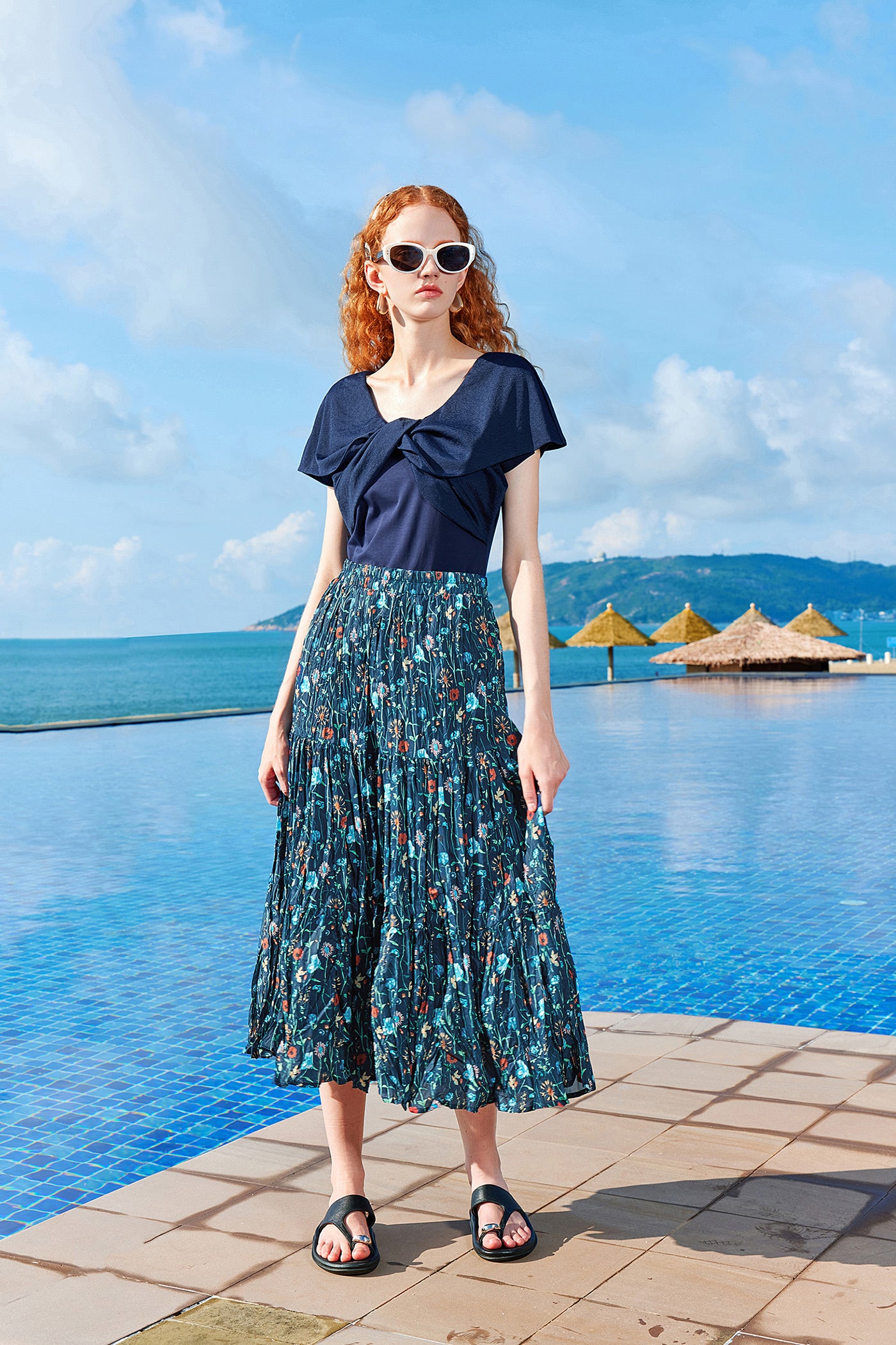 KAMILAN Pleated Midi Skirt in Ocean Blue Floral Print