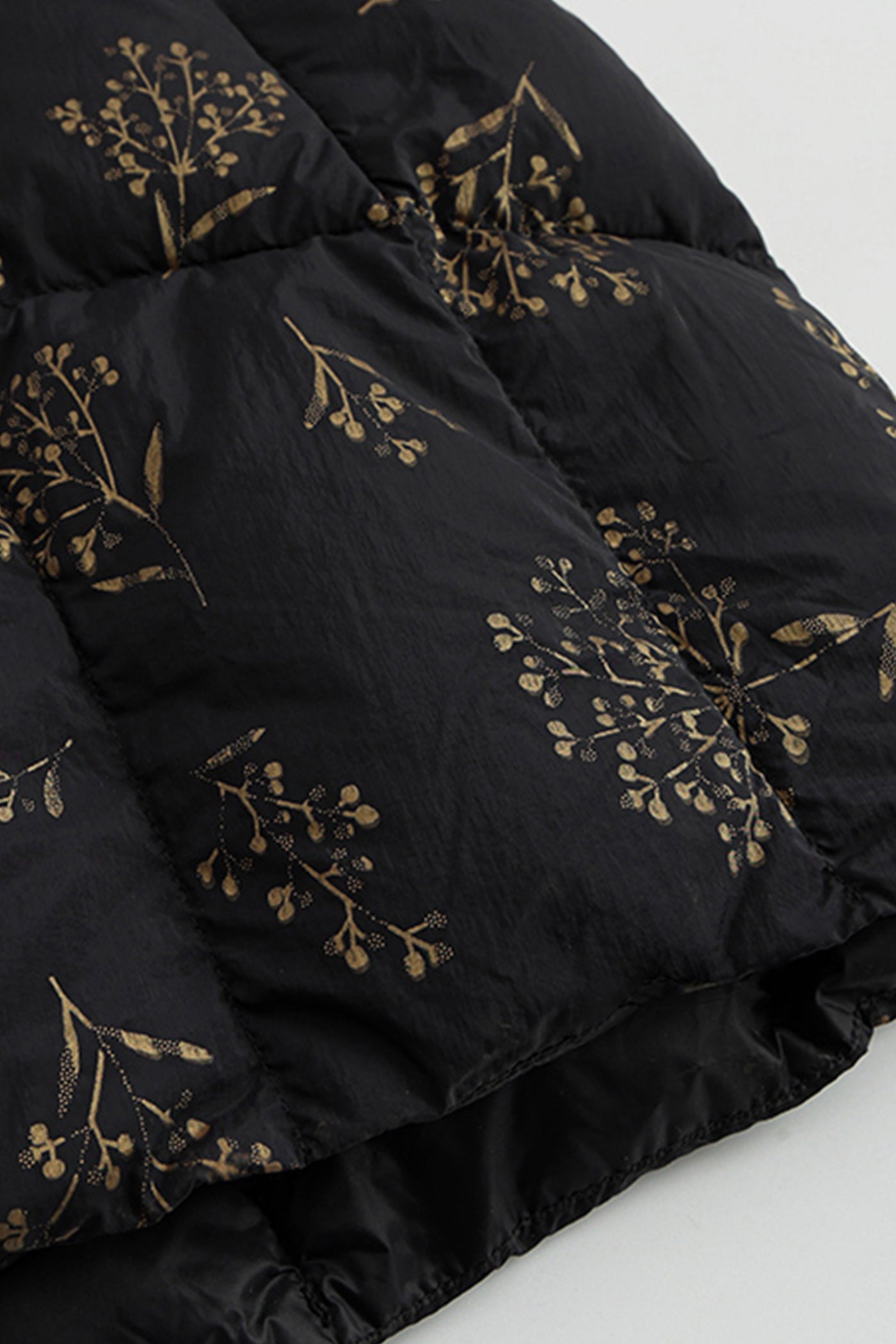 KAMILAN Noir Botanique Quilted Down Coat with Golden Motif