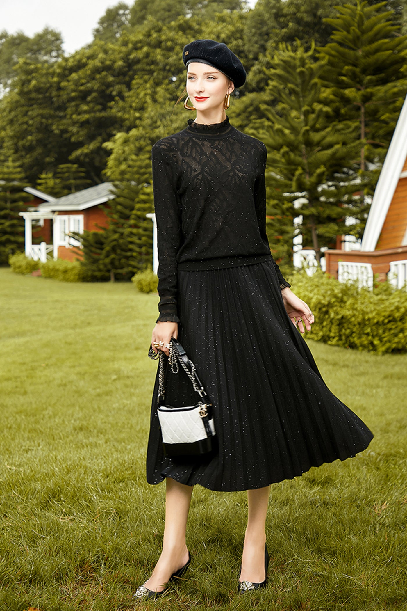 KAMILAN Glitter Pleated Midi Skirt in Flowing Silhouette