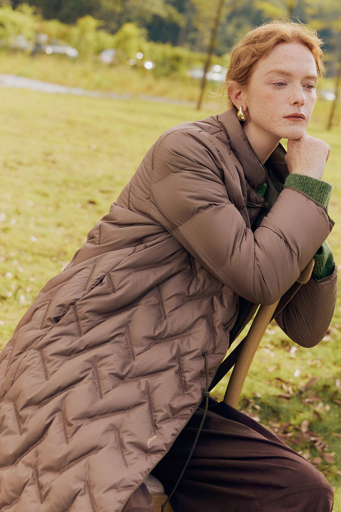 KAMILAN Quilted Mid-Length Down Coat in Sculptural Form