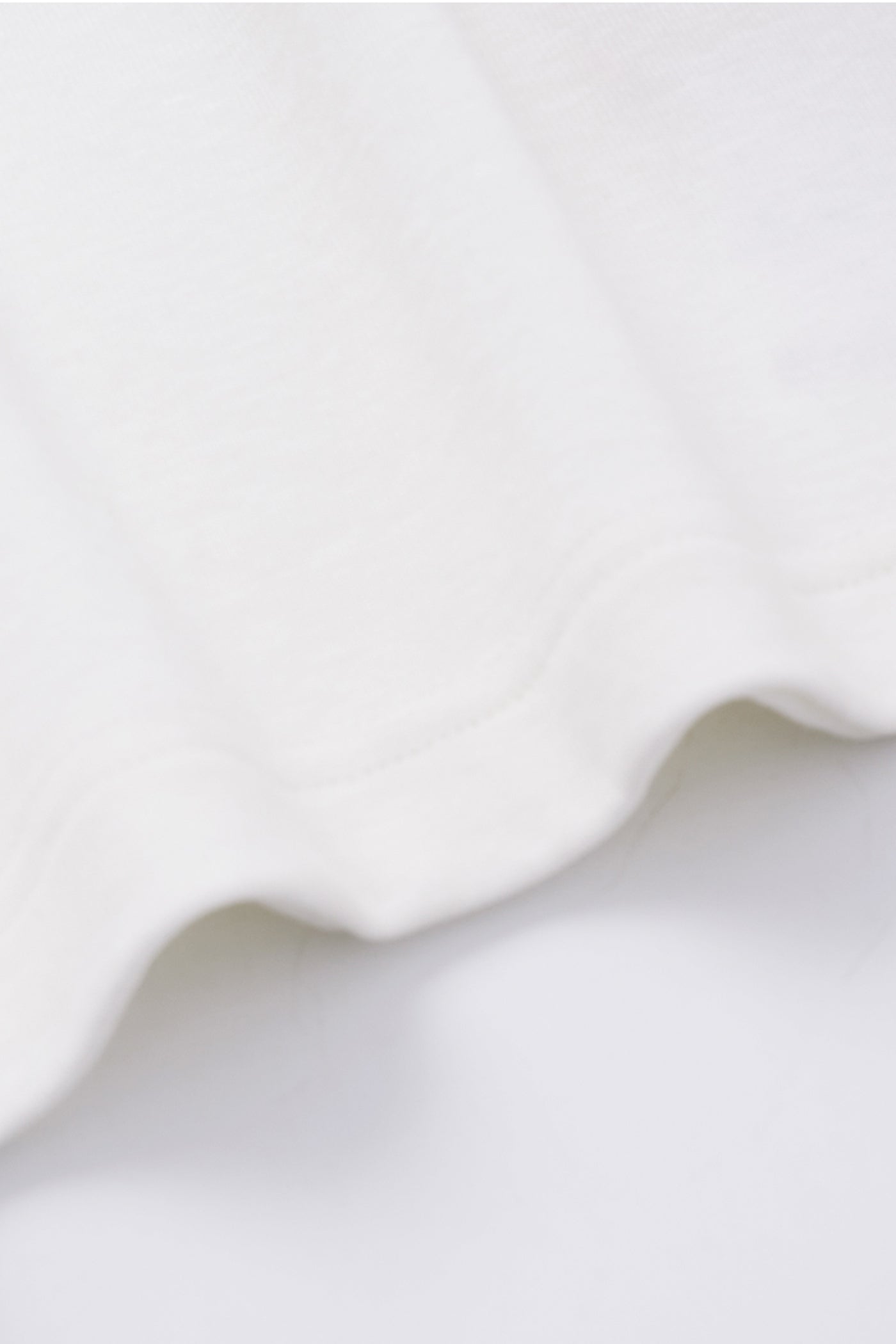KAMILAN Ivory White Tee with Embroidered Pocket Detail