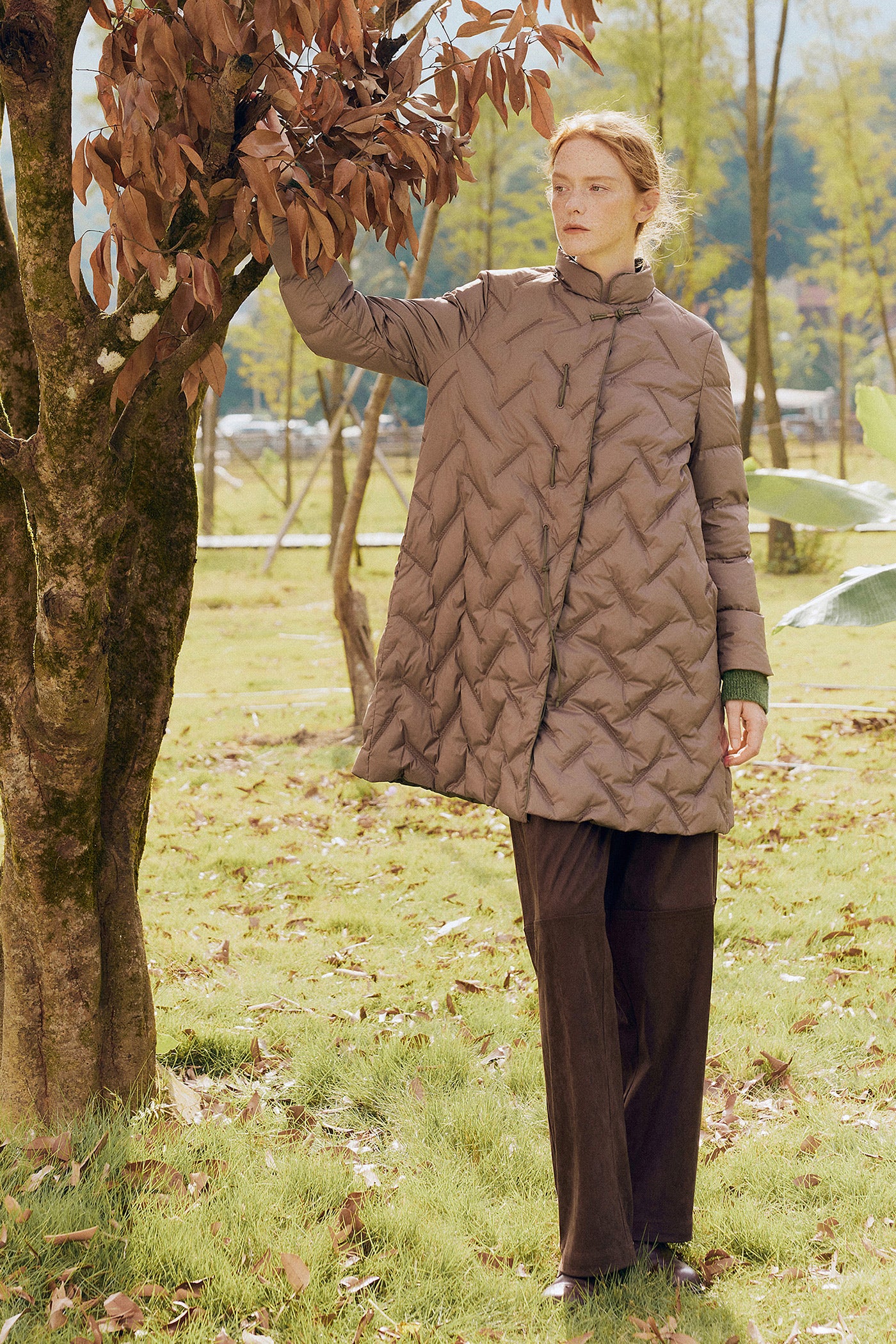 KAMILAN Quilted Mid-Length Down Coat in Sculptural Form